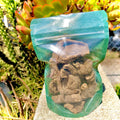 A package of Medicinas Naturales Valeriana TEA, with a transparent front showing the tea inside bag.